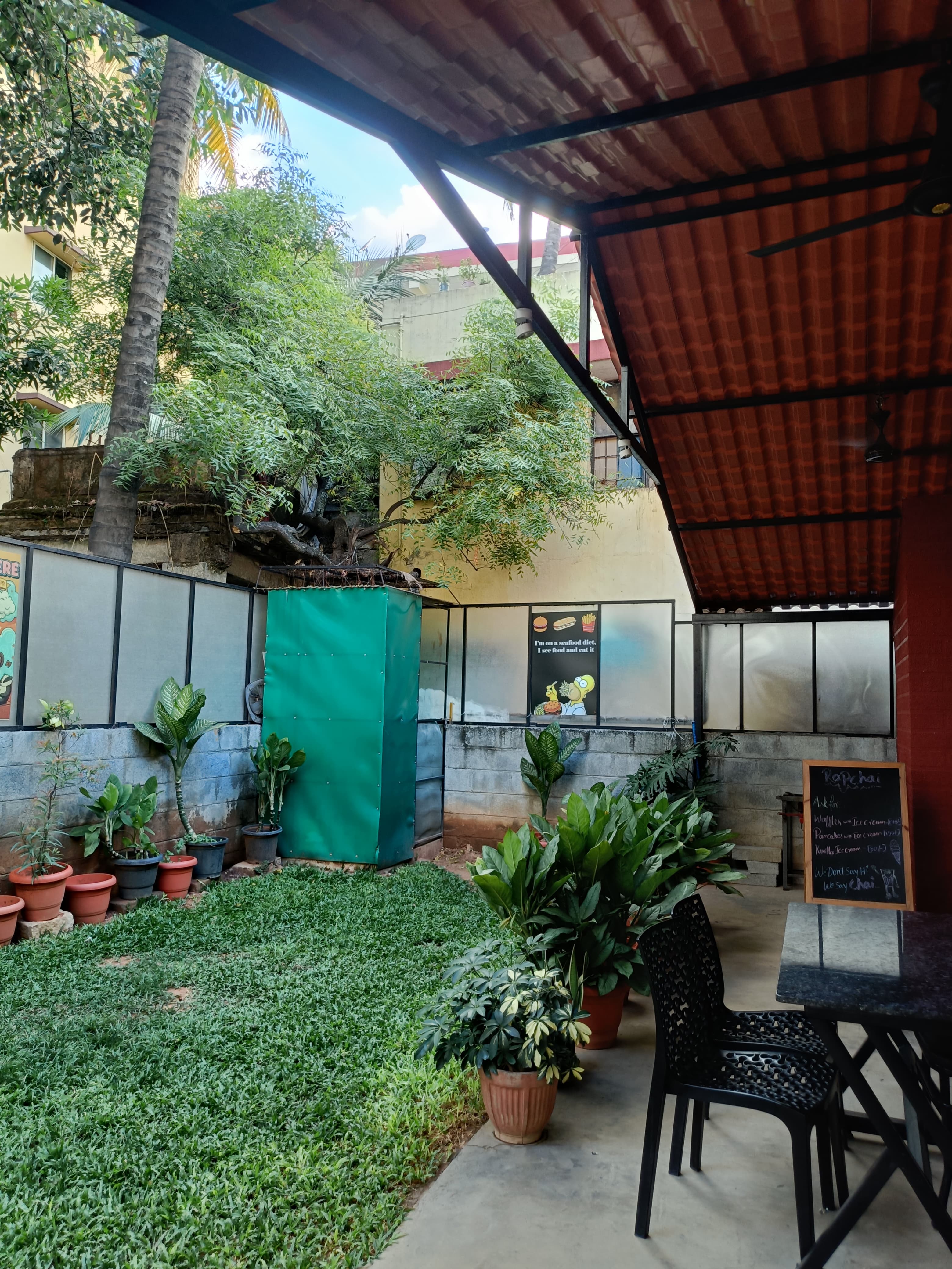 Rapchai garden seating area with lush greenery